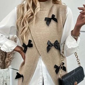 Elegant Cream Sweater with Black Bow Accents